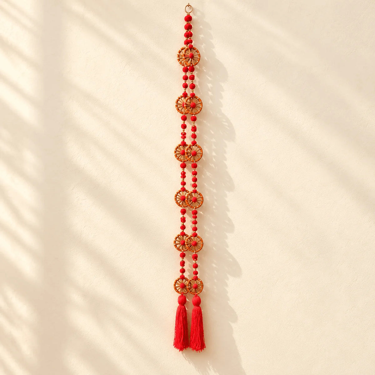Orange Ring with Orange Tassle Hanging