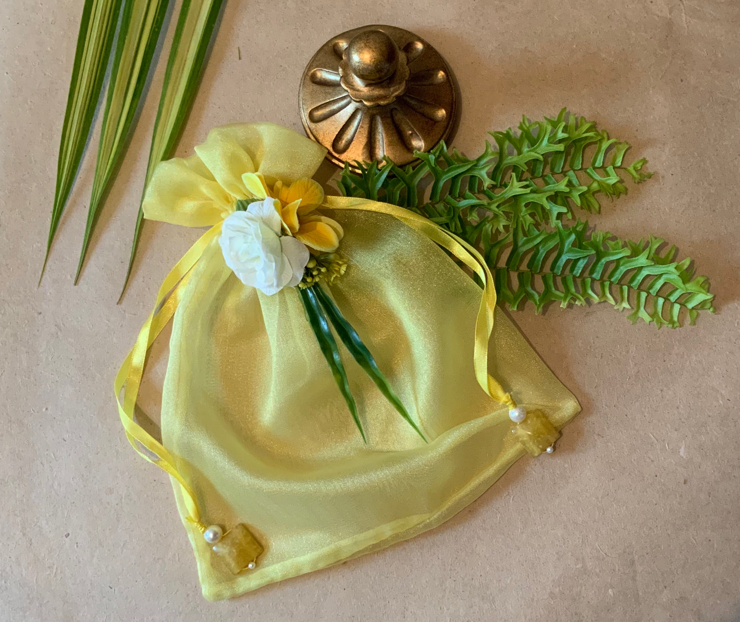 Yellow with fabric flowers