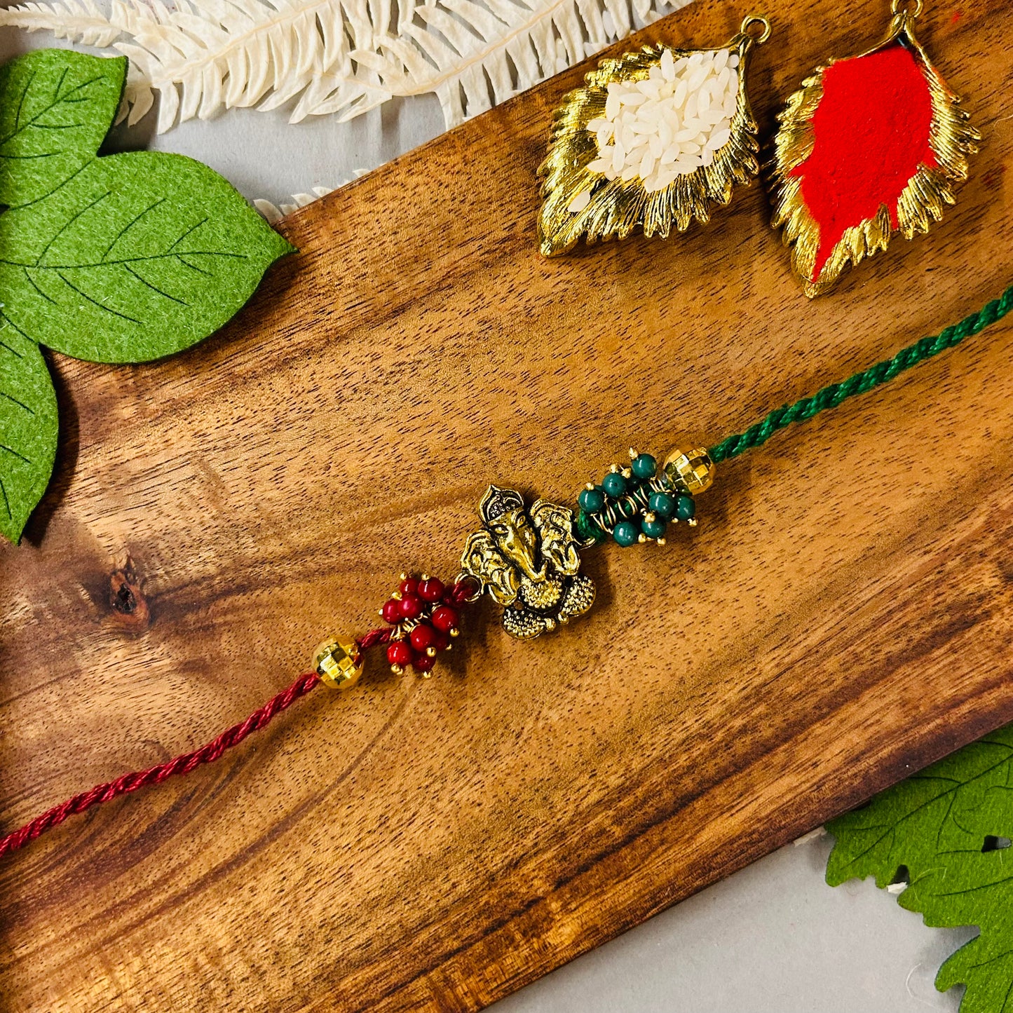 Maroon Green Ganeshji Rakhi