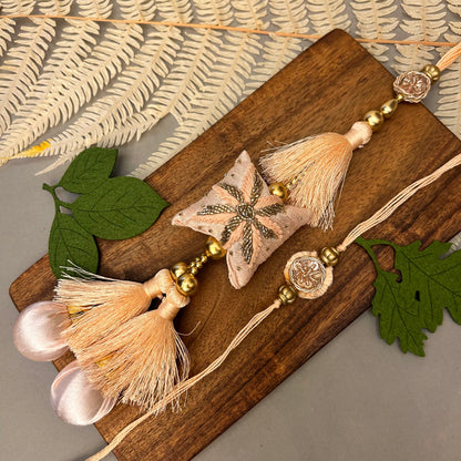 Pillow Rakhi & Lumba Set - handcrafted Rakhi & Lumba set, close-up | Traditions4u