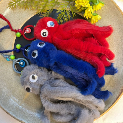 Octopus Fuzzy Lumba - handcrafted Lumba rakhi for bhabhi, close-up | Traditions4u