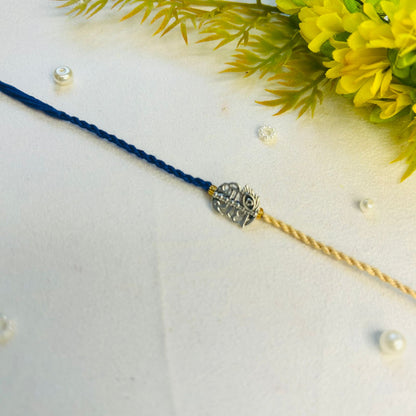 Shri Radhe Sadi - handcrafted Sadi thread rakhi, close-up | Traditions4u