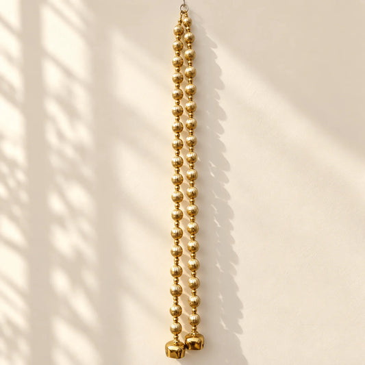 Golden Apple Gota Balls with a Bell Hanging