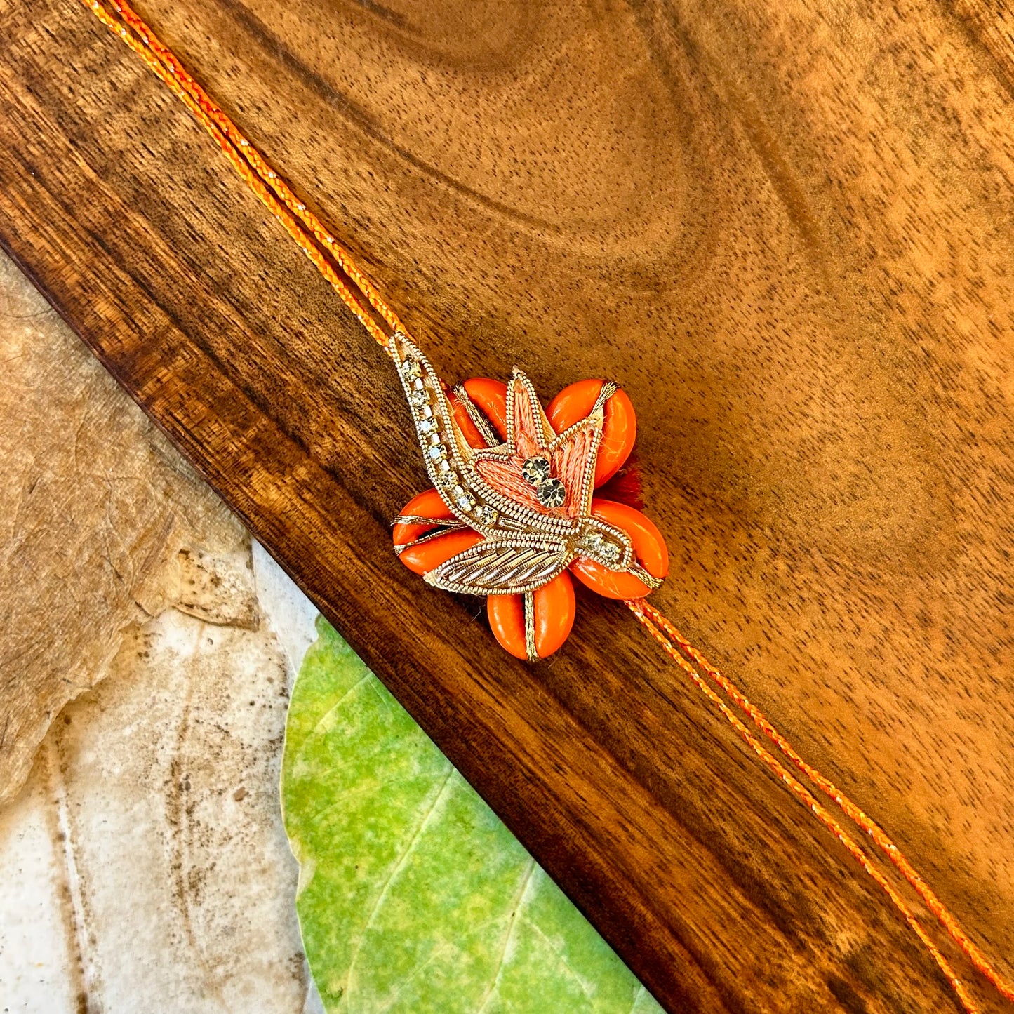 Five petal orange kaudi chakalya