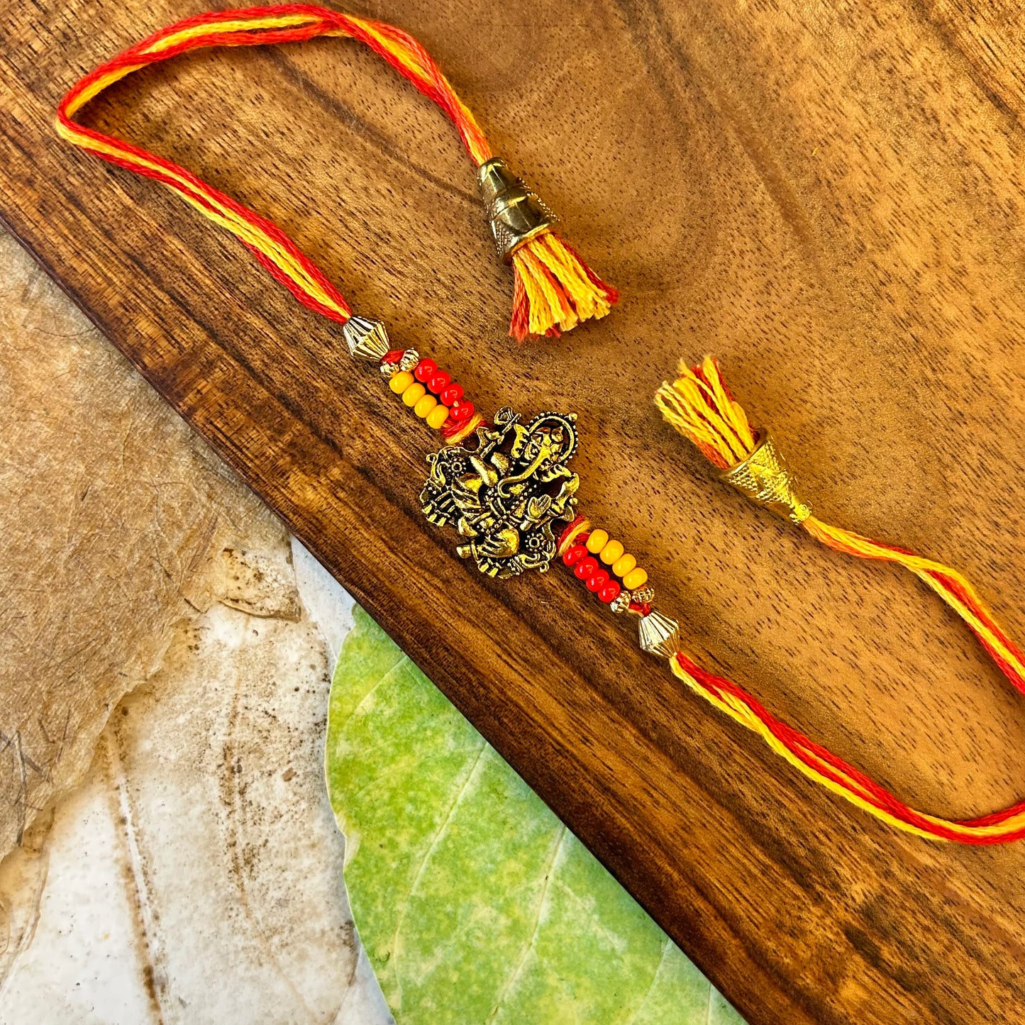 Ganeshji with red yellow beads sadi