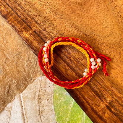 Kishori White Rakhi - handcrafted Sadi thread rakhi, design detail | Traditions4u