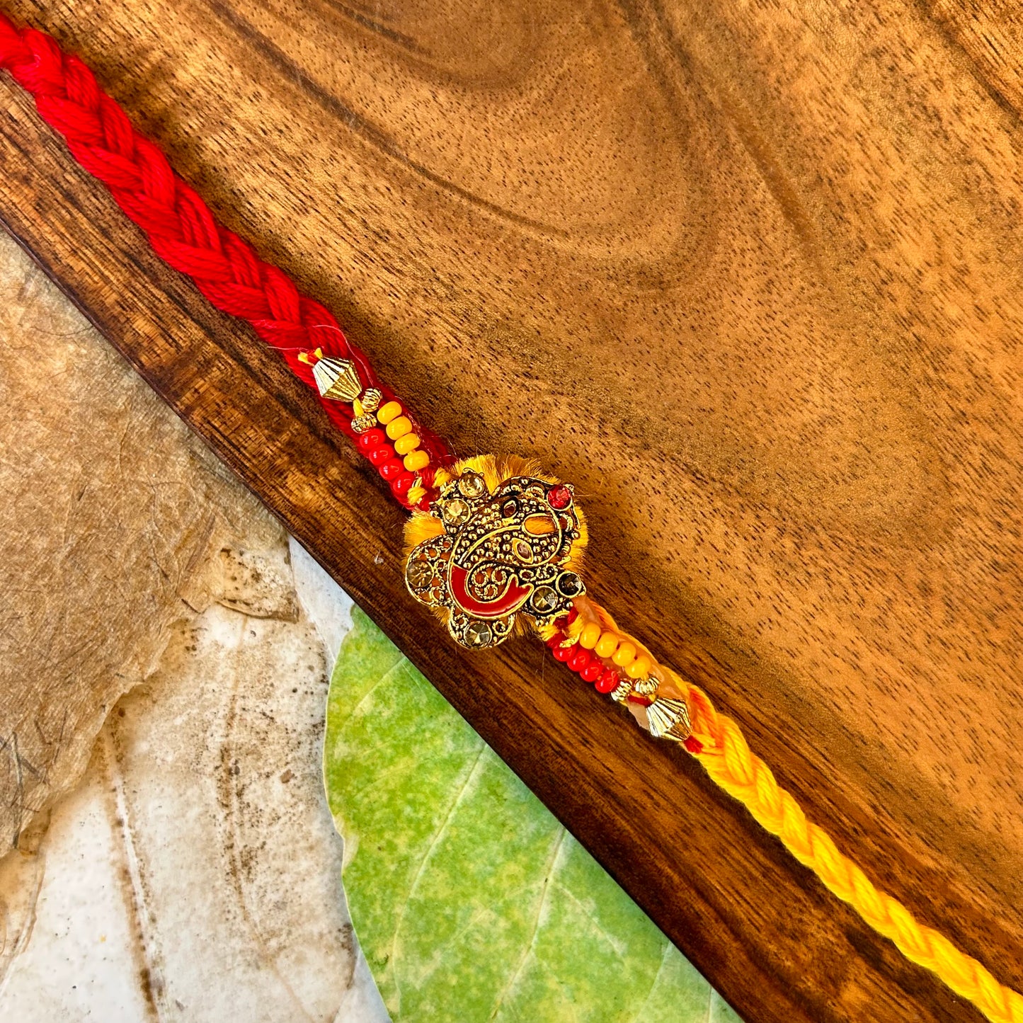 Studded Ganeshji on braided moli sadi