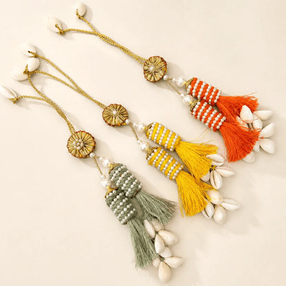 Candle Shape Lumba with Kaudi - handcrafted Lumba rakhi for bhabhi | Traditions4u