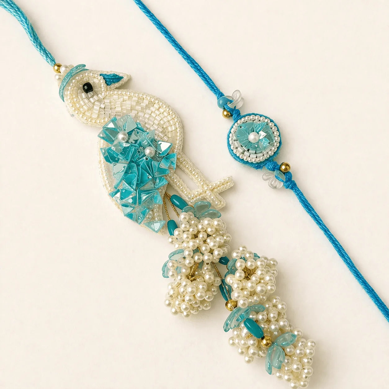 Flamingo Rakhi & Lumba Set - handcrafted Rakhi & Lumba set for bhaiya-bhabhi | Traditions4u