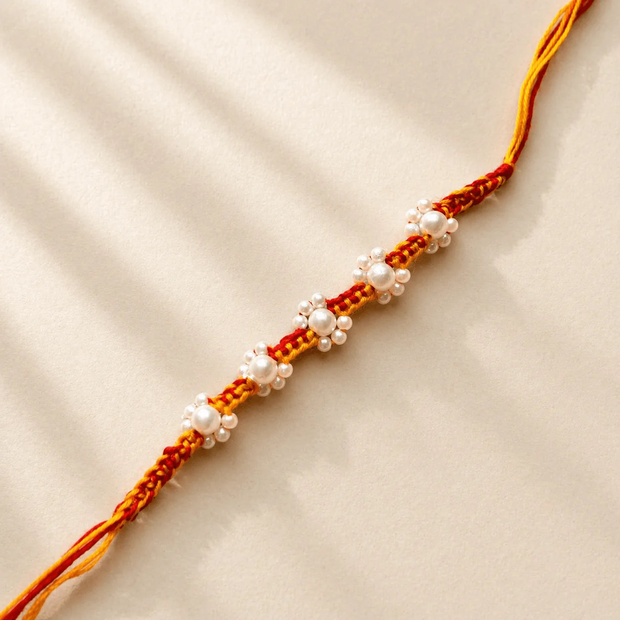 5 Pearl Flower in Macrame Sadi Rakhi