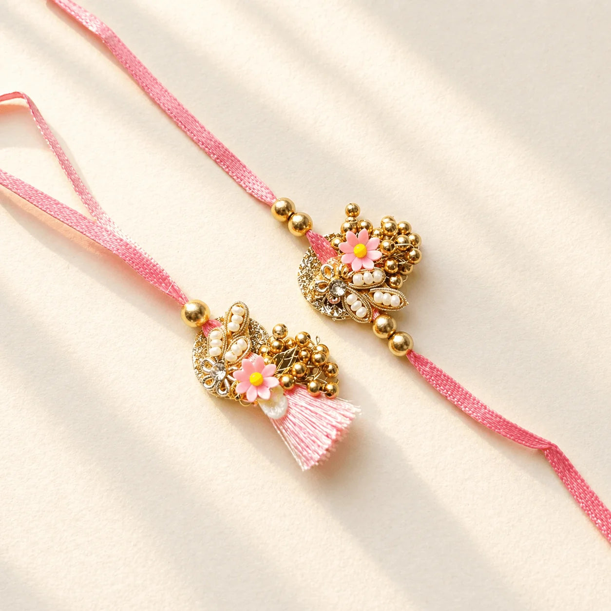 Pink & Golden Bunch Small Rakhi Set - handcrafted Rakhi & Lumba set for bhaiya-bhabhi | Traditions4u