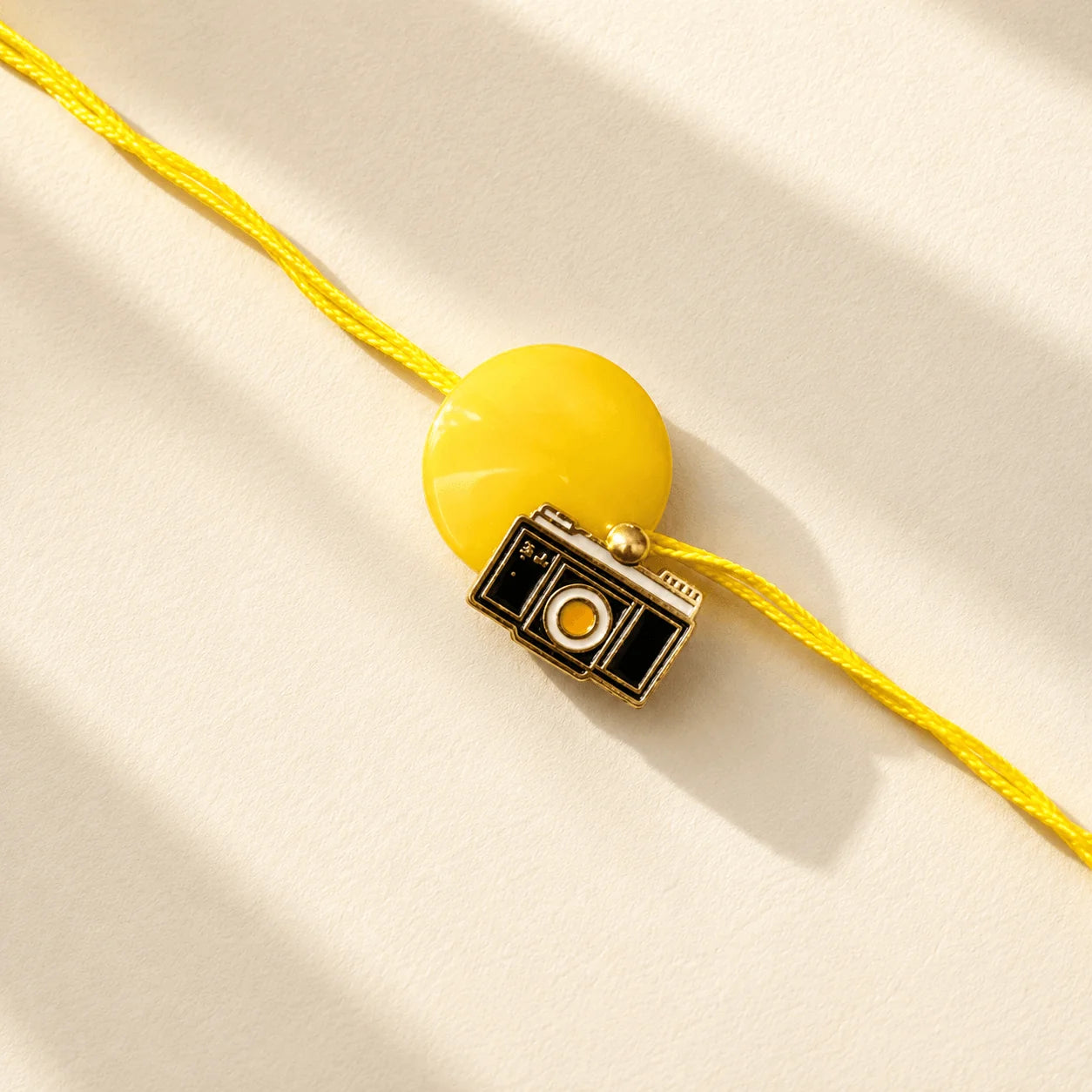 Big Button Camera Rakhi