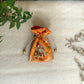 Melange on Orange brocade